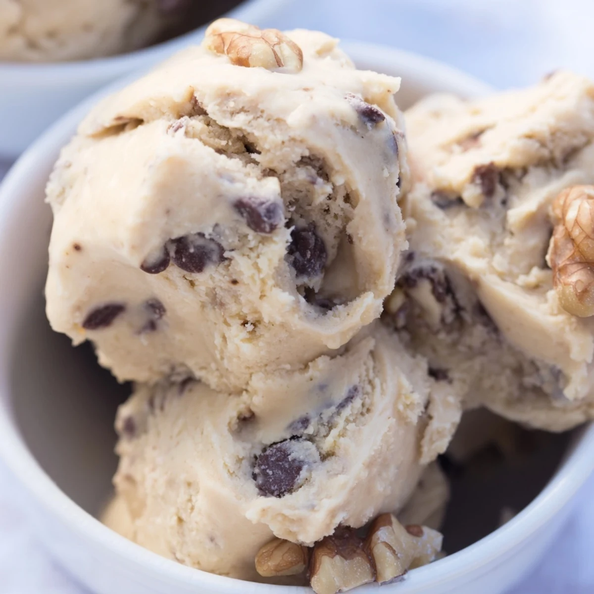 Healthy Guilt Free Greek Yogurt Cookie Dough served with apple slices and pretzels for dipping.