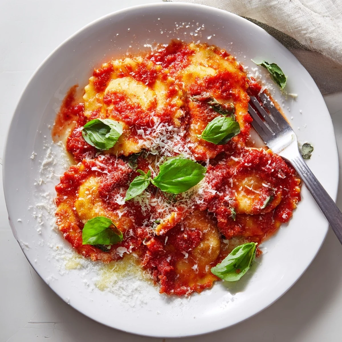 Perfectly cooked 20-Minute Ravioli with Simple Sauce glistening in a white bowl.