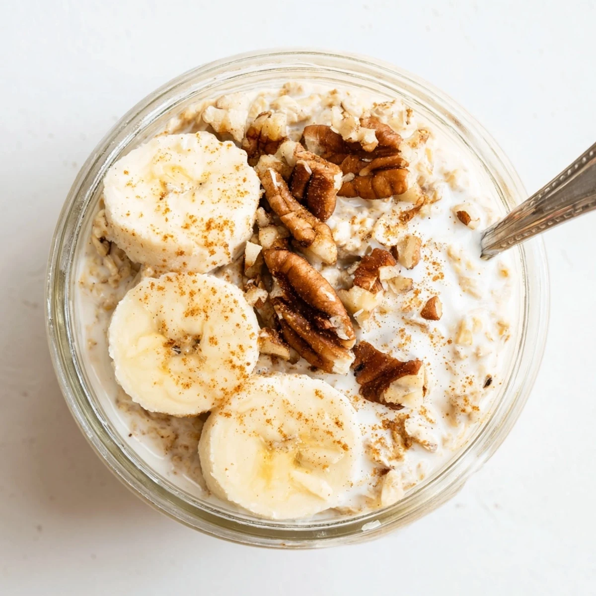 Wholesome brown sugar overnight oats layered with cinnamon-spiced yogurt and colorful berry toppings ready for breakfast