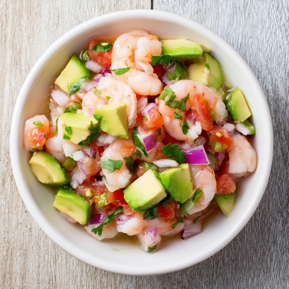 Colorful easy shrimp ceviche served chilled with bright vegetables and herbs for a refreshing appetizer.