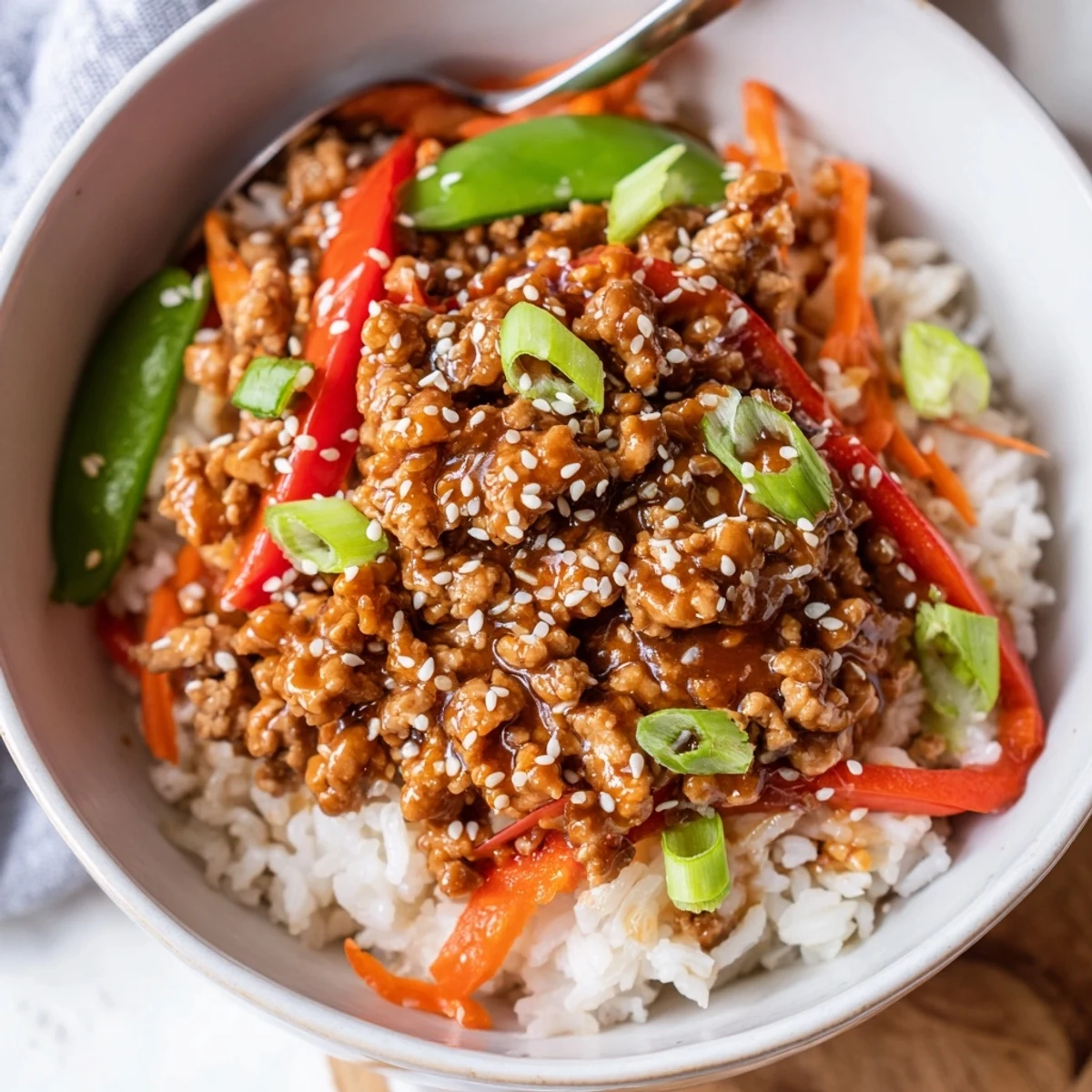 Weeknight Teriyaki Turkey Rice Bowls: savory glazed turkey, bright peppers, sesame crunch