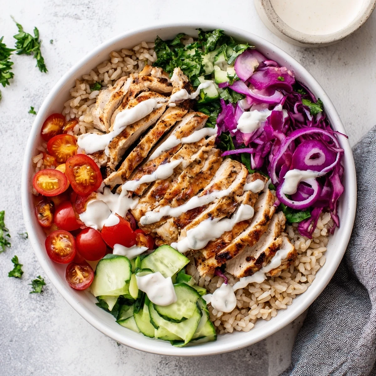 Vibrant healthy chicken shawarma bowl topped with spiced grilled chicken and fresh vegetables