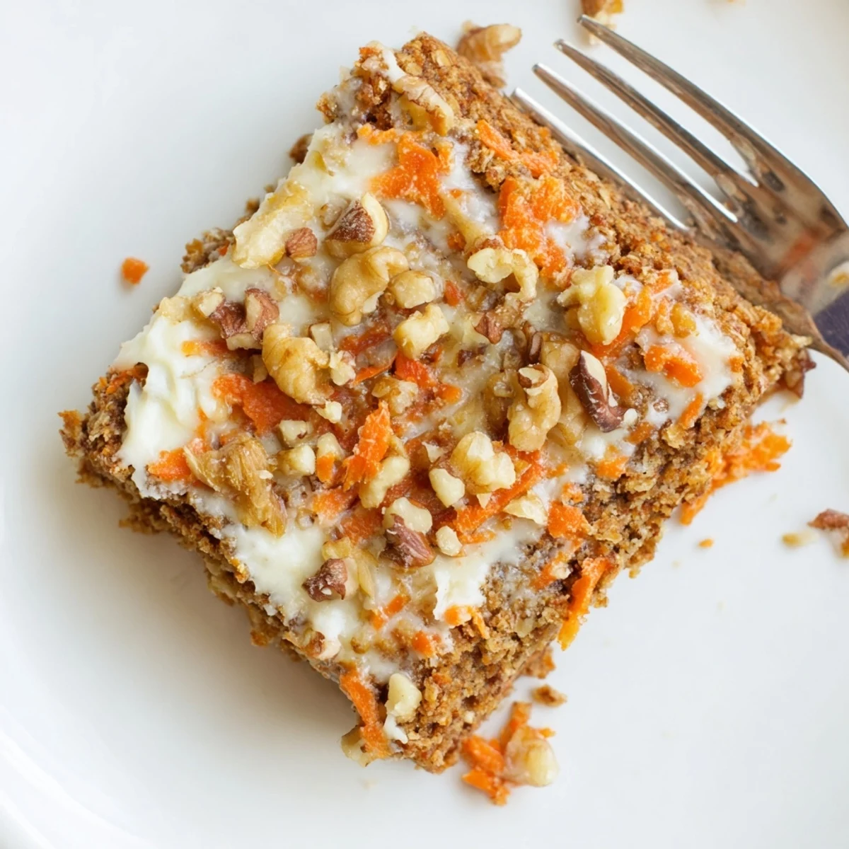 Homemade flourless carrot cake dessert showing tender crumb with sweet raisin and pecan add-ins