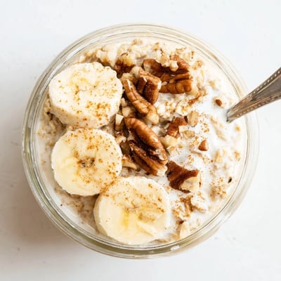 Wholesome brown sugar overnight oats layered with cinnamon-spiced yogurt and colorful berry toppings ready for breakfast