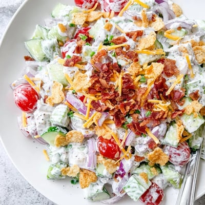 Bright Cucumber Ranch Crack Salad tossed in creamy ranch, crunchy chip topping